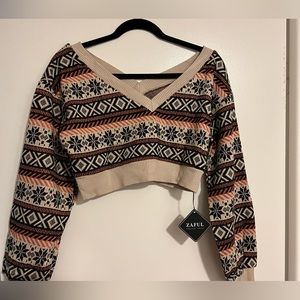 Patterned crop sweater shirt.